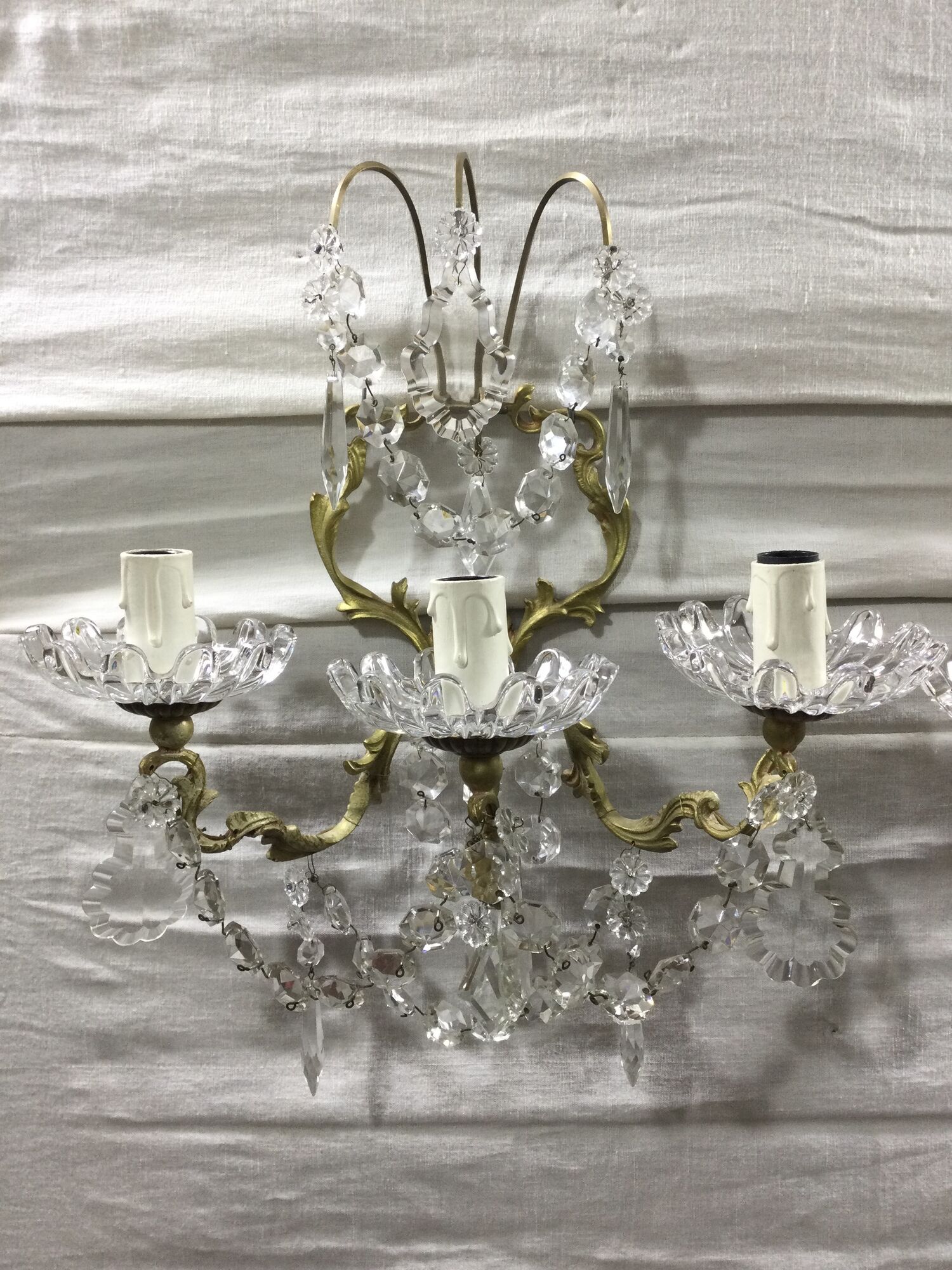 Pair of 3-light bronze and crystal wall lights