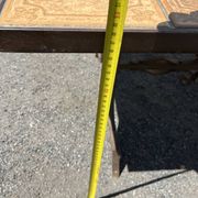 Vintage garden table with ceramic tile top and wrought iron base