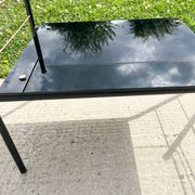 Metal and glass coffee table with magazine rack by Roche Bobois from the 1950s.