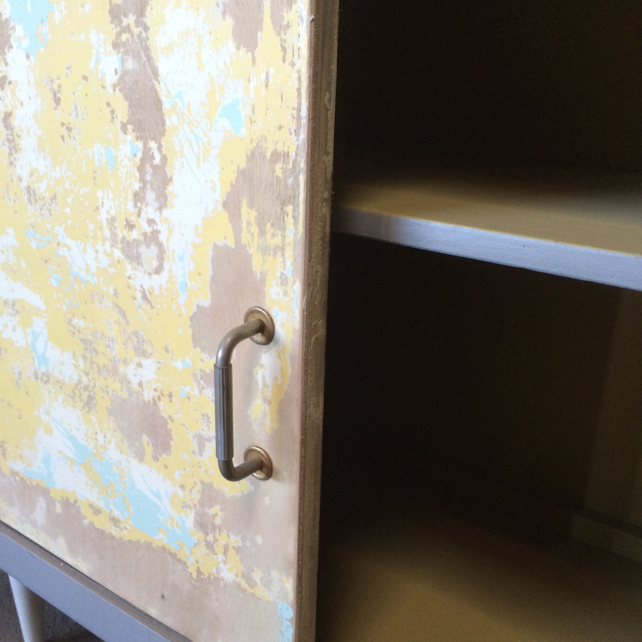 Vintage sideboard with patinated effect