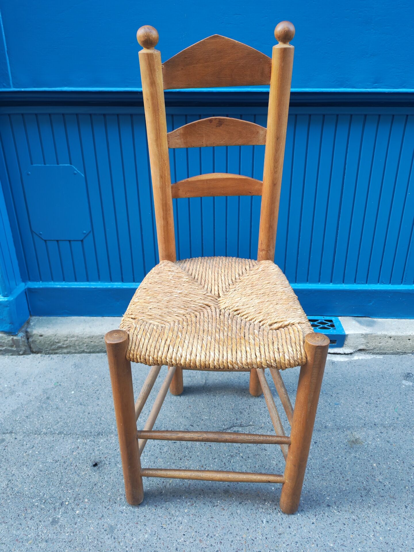 Neo-rustic chair in wood and wicker in the brutalist style by Charles Dudyoyut.