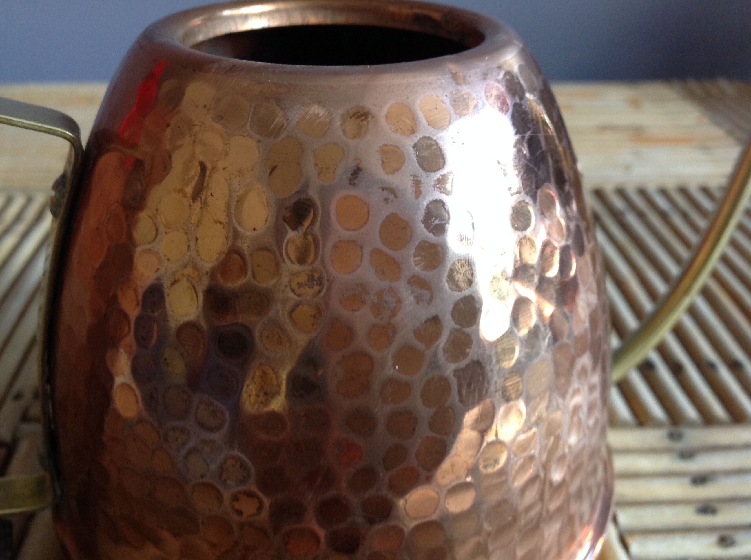 Copper and brass watering can