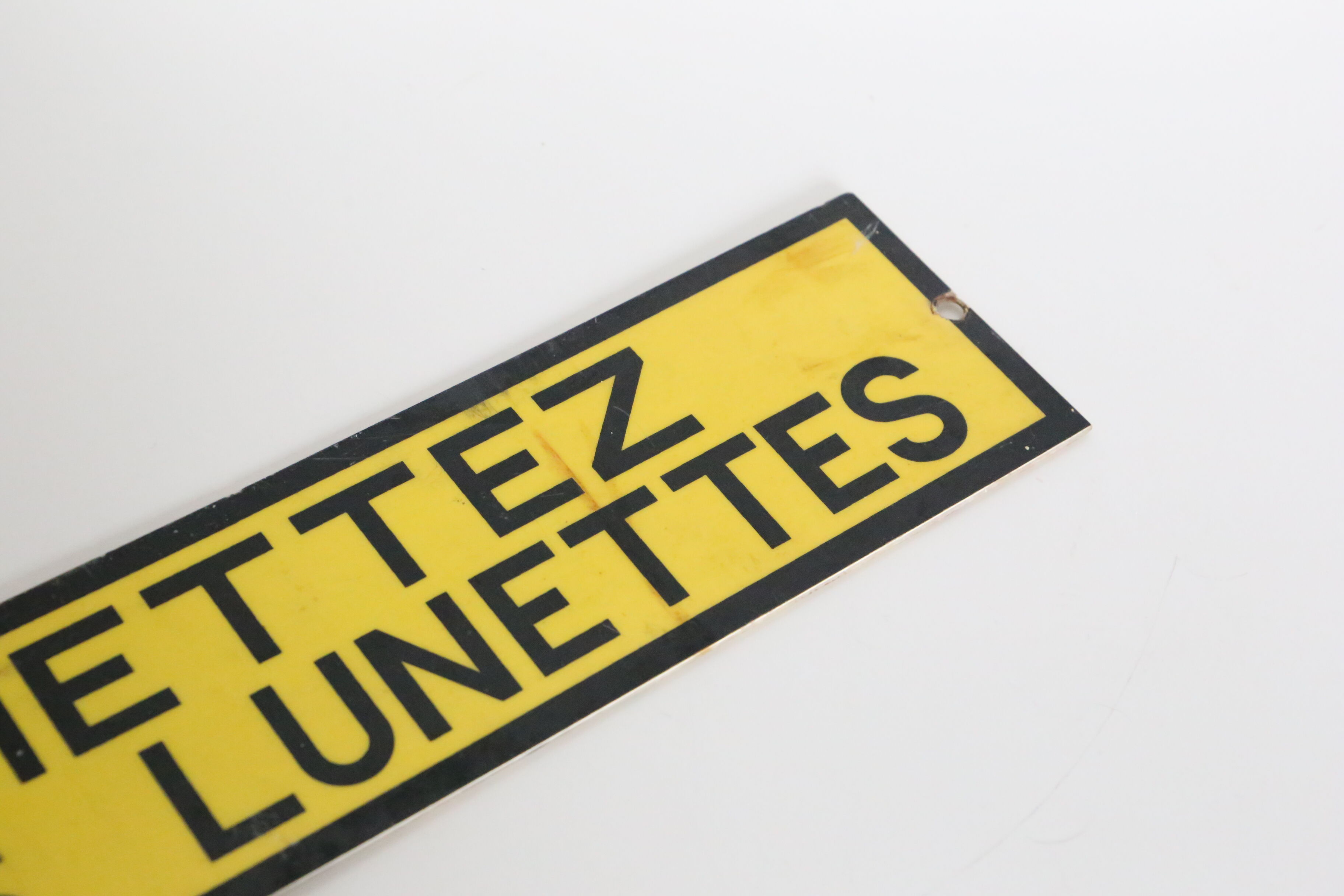 Warning industrial plate "put your glasses"