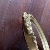 Oval wall mirror in baroque gilded plaster frame 29x20cm