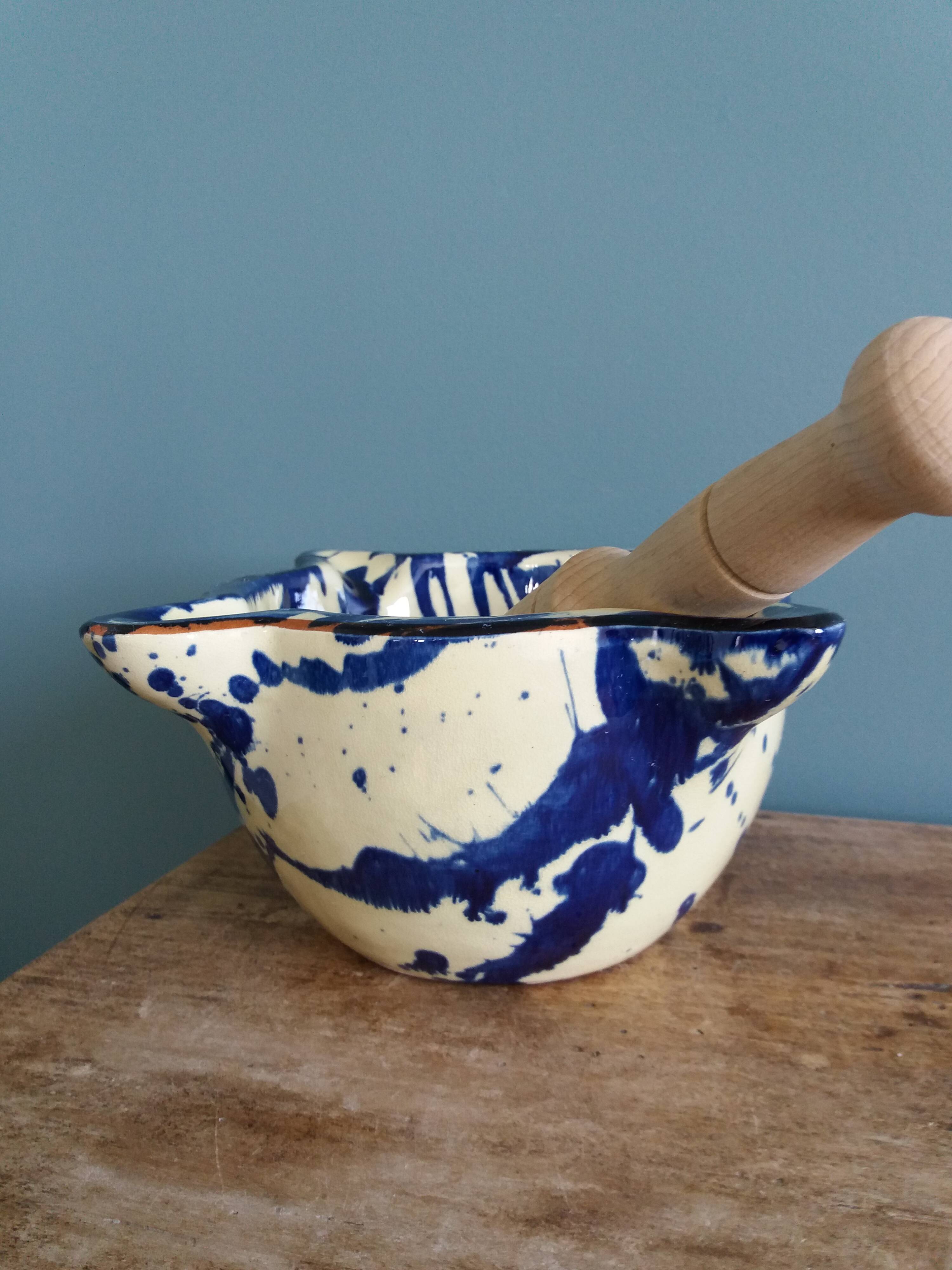 Glazed terracotta mortar and wooden pestle