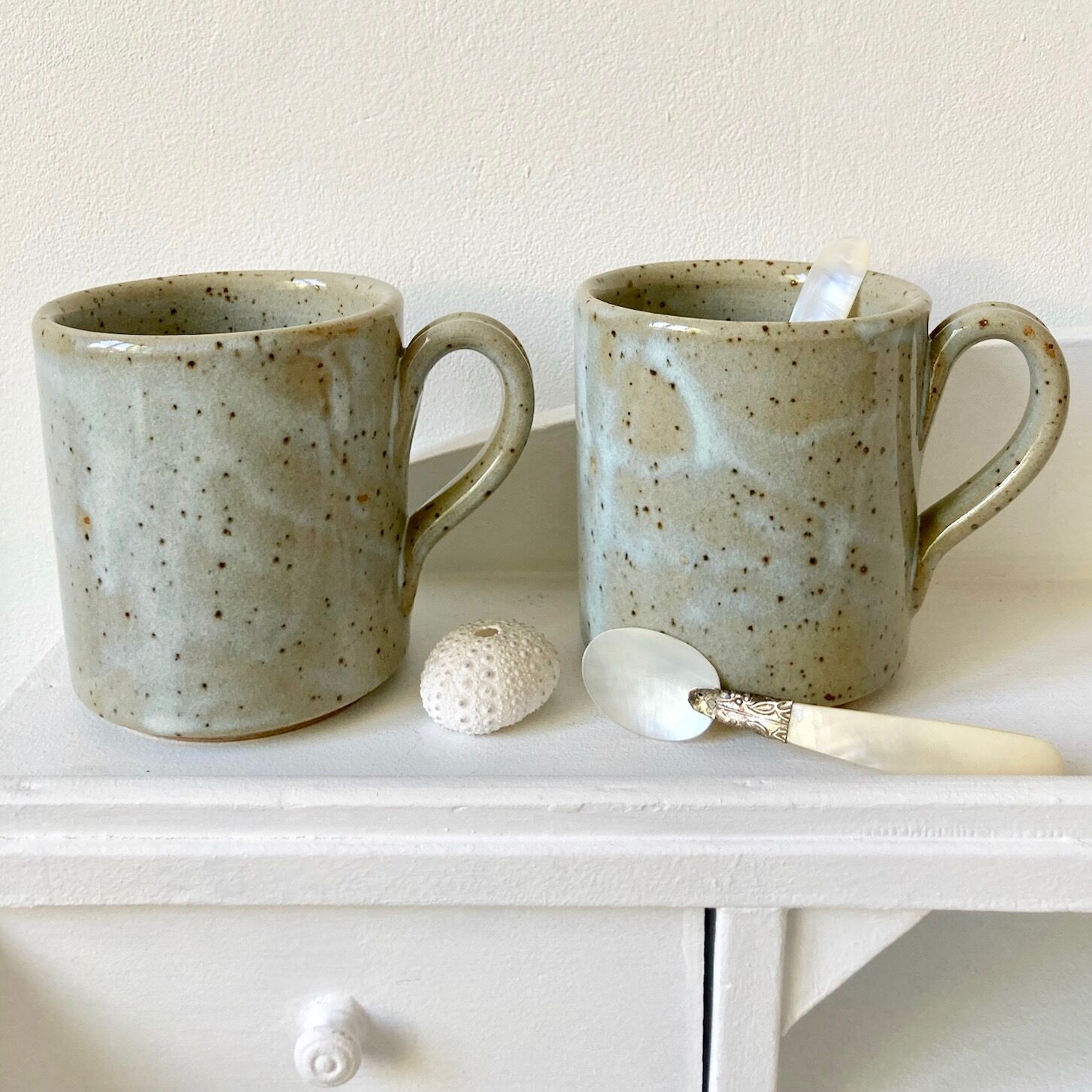 Pair of enamelled stoneware mugs