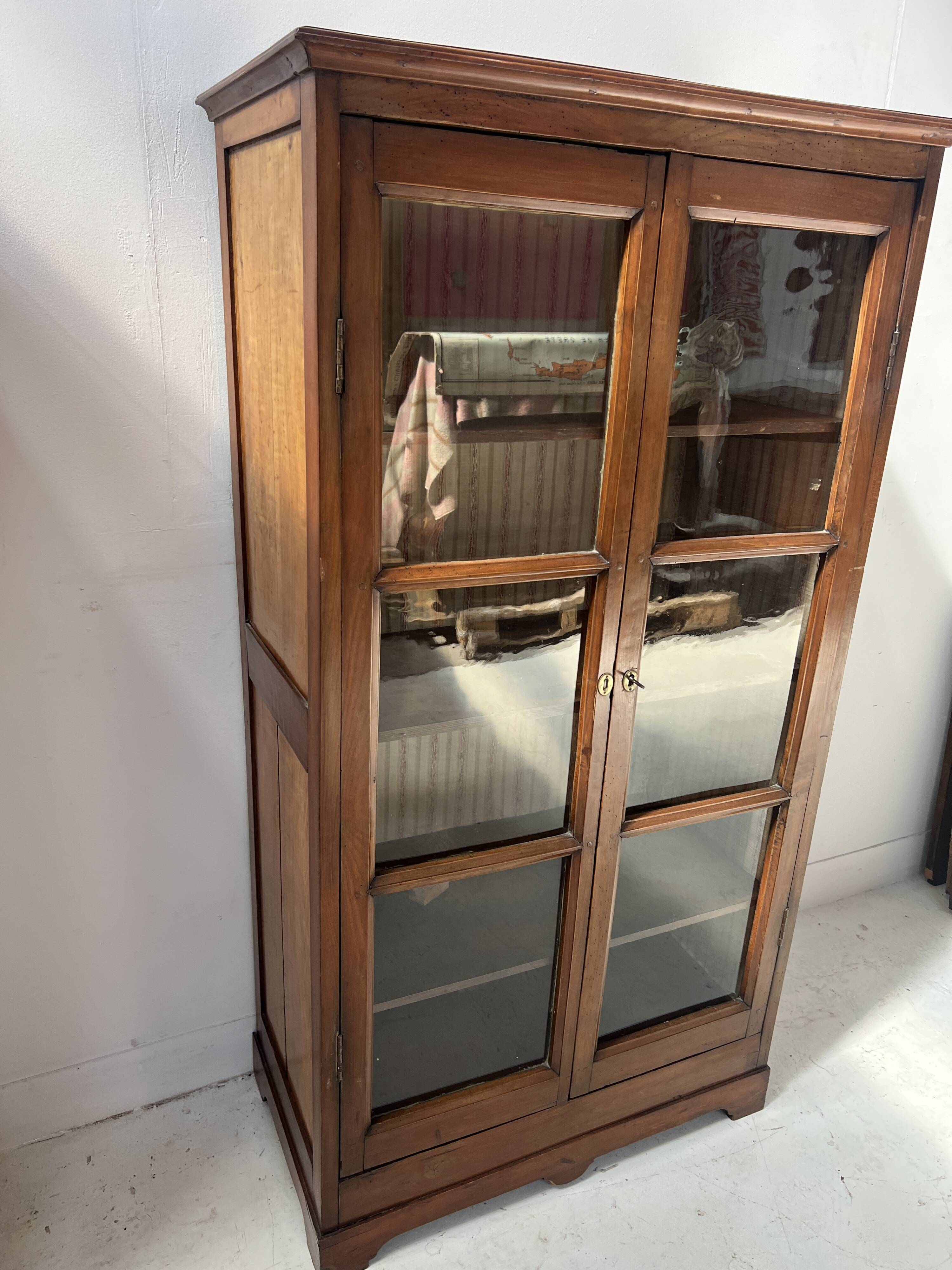 Pair of display cabinets in solid cherry wood from the 19th century.