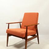Scandinavian design curly orange armchair by H.Lis