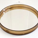 Space age round mirror with a smoked acrylic border
