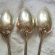 8 teaspoons made of silver metal