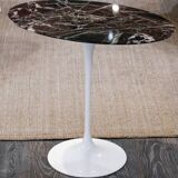Knoll oval pedestal table in Rosso Rubin marble