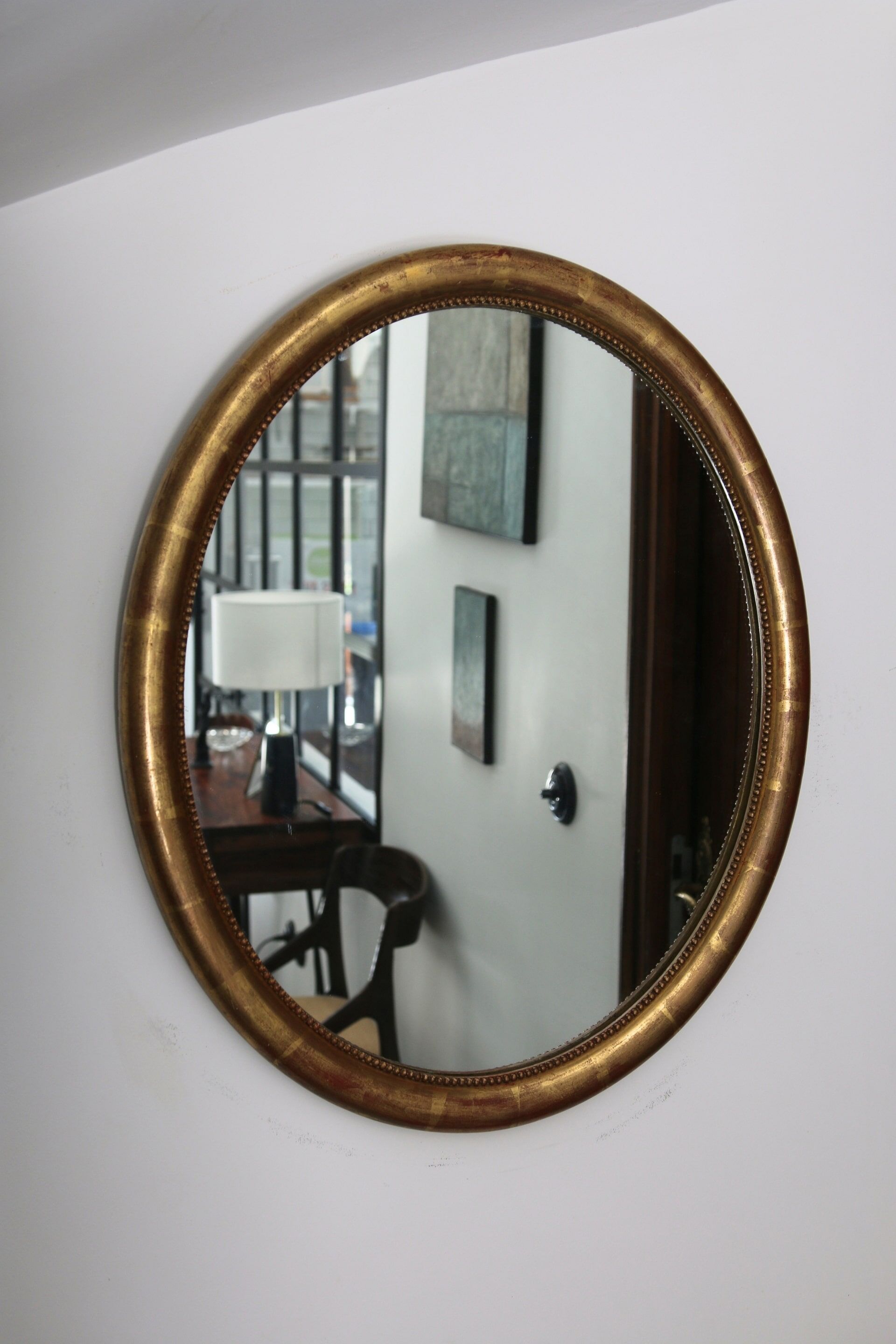 Oval mirror with gilded wood, Napoleon III medallion.