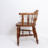 Elm armchair with curved back