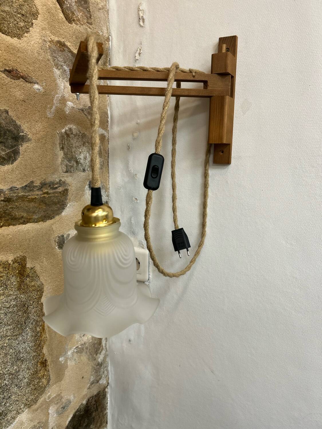 Two portable lamps with wall mount.