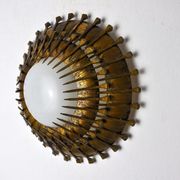Midcentury brutalist sun wall lamp, metal and gold leaf, Italy