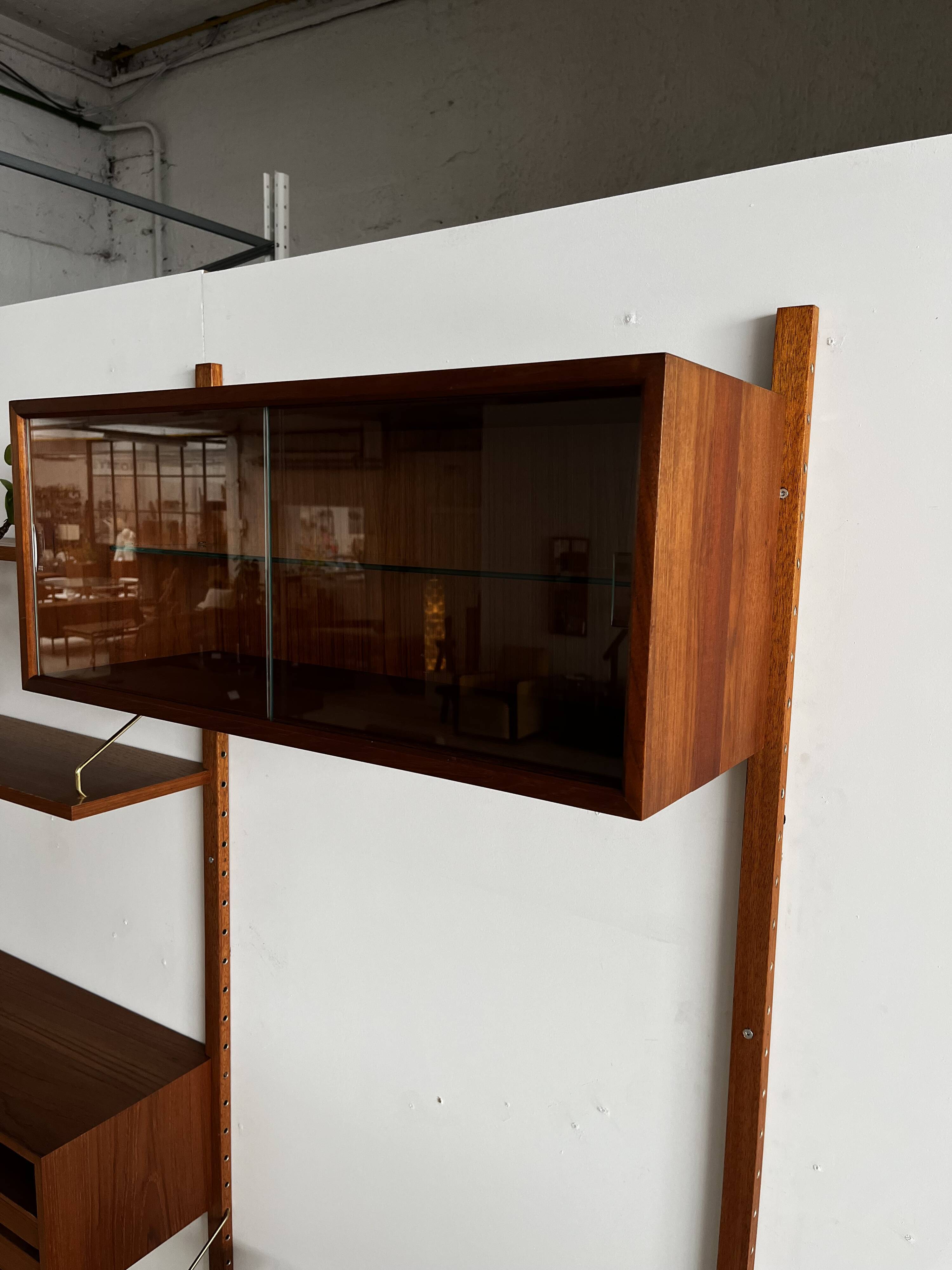 A wall unit with 4 compartments by Poul Cadovius, Denmark, 1960s.