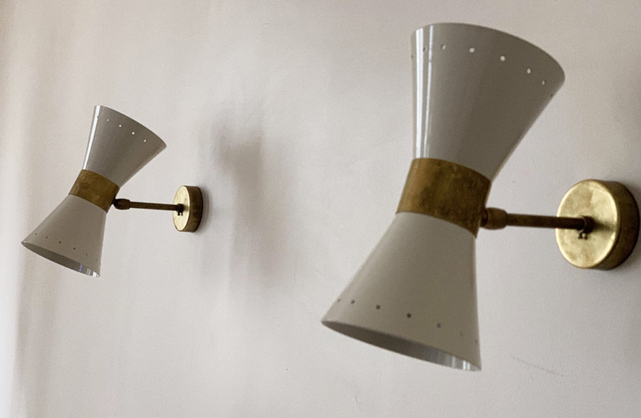 Pair of white diabolo wall lights