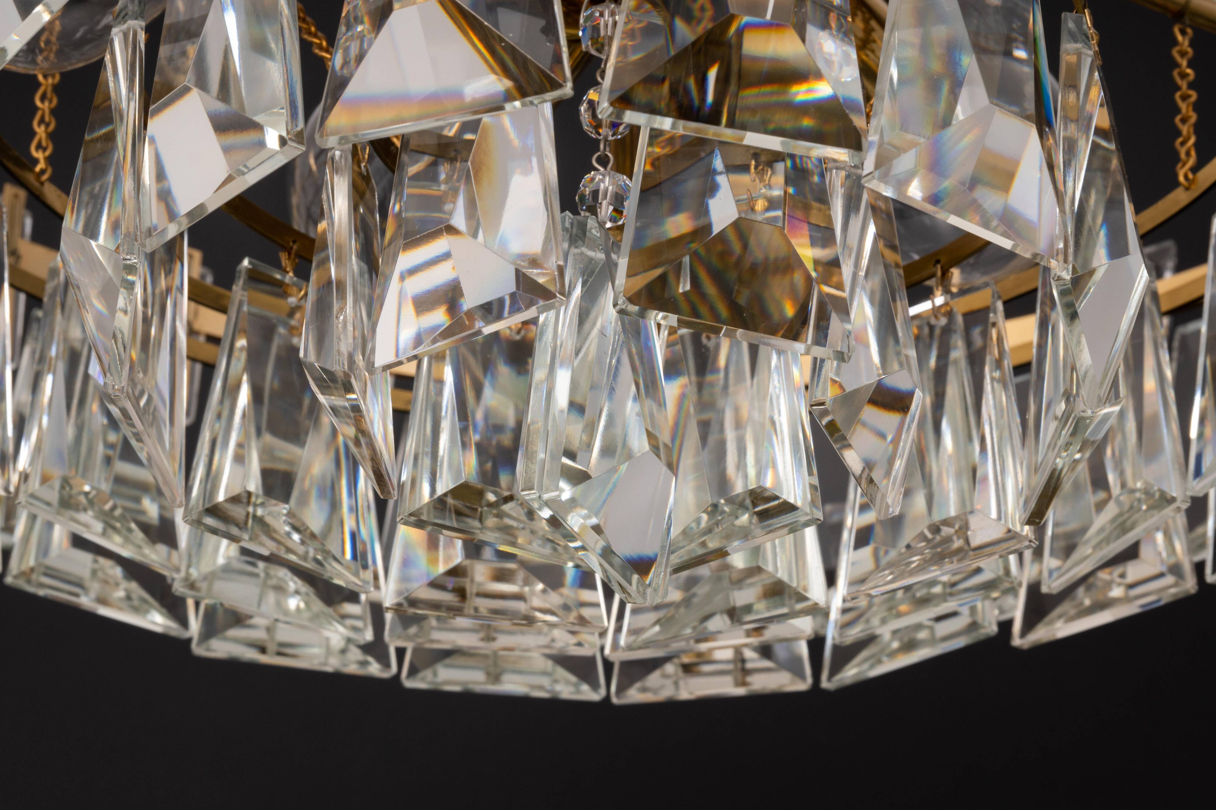 Large chandelier in gilded brass and crystal, by Palwa, Germany, 1970s.