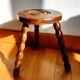 Turned wooden tripod stool