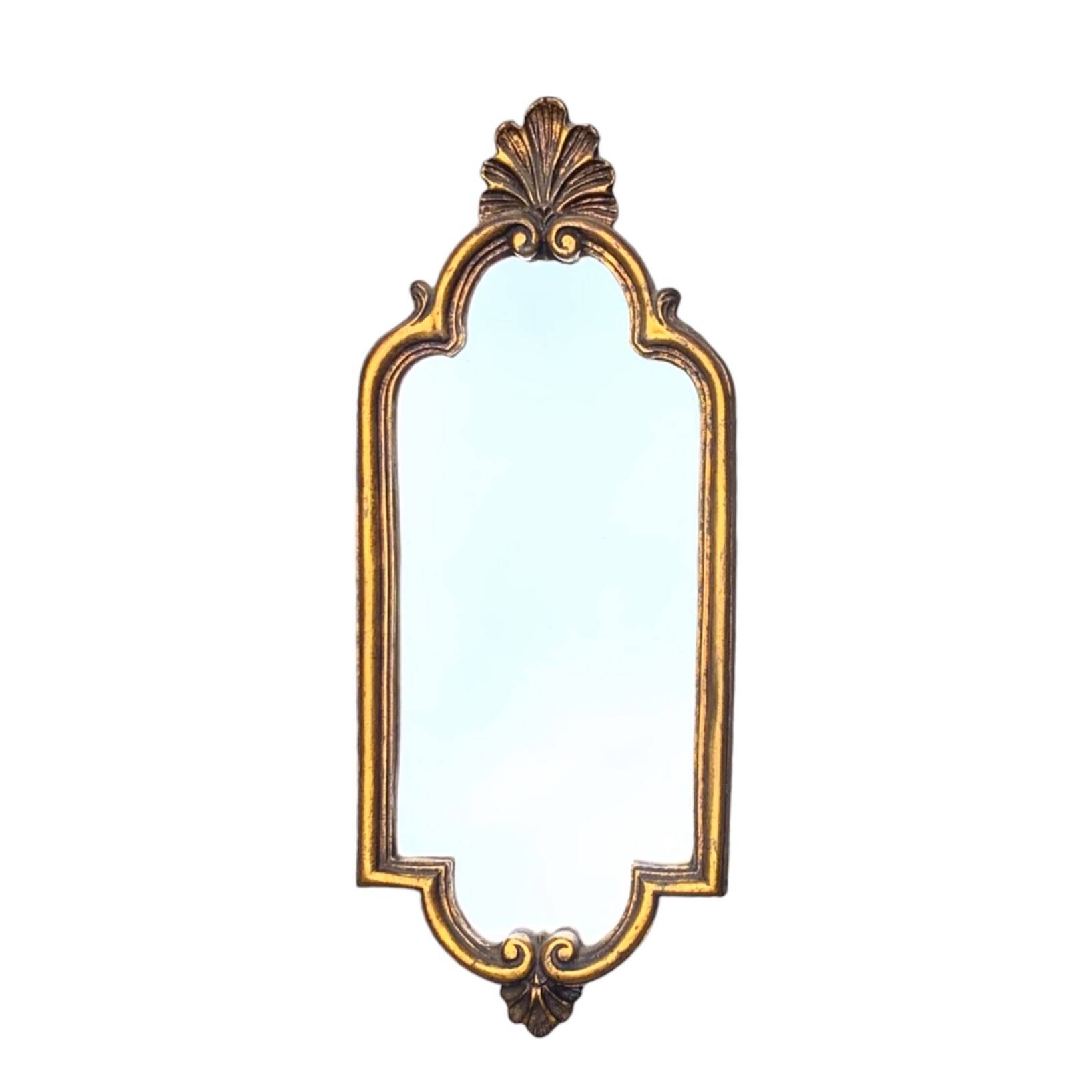 Old small wall mirror in golden resin