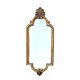 Old small wall mirror in golden resin