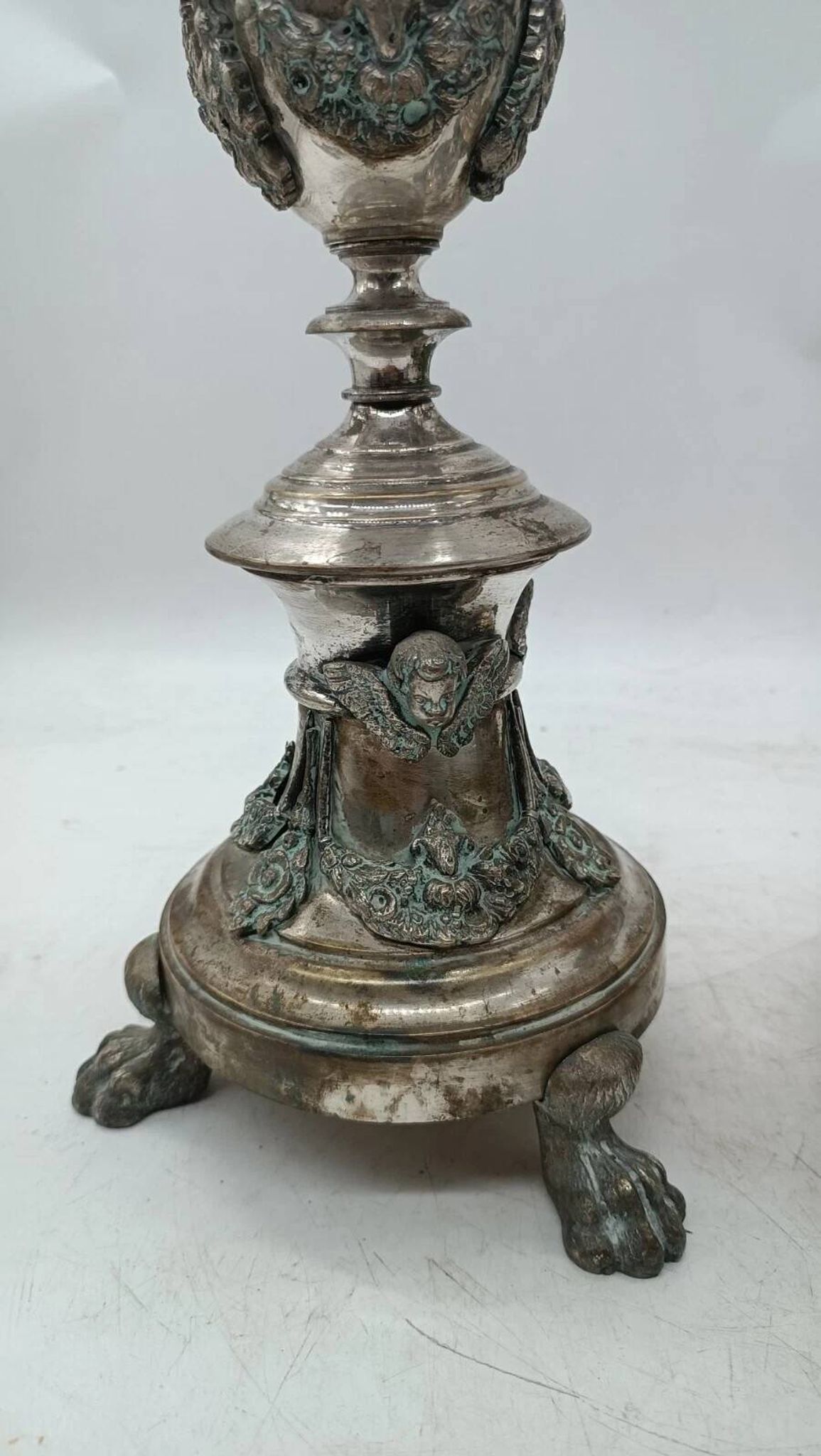Pair of silver-plated bronze candlesticks in the Empire style, early 19th century, height 70 cm