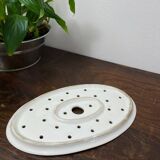 Old iron clay draining plate