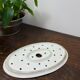 Old iron clay draining plate