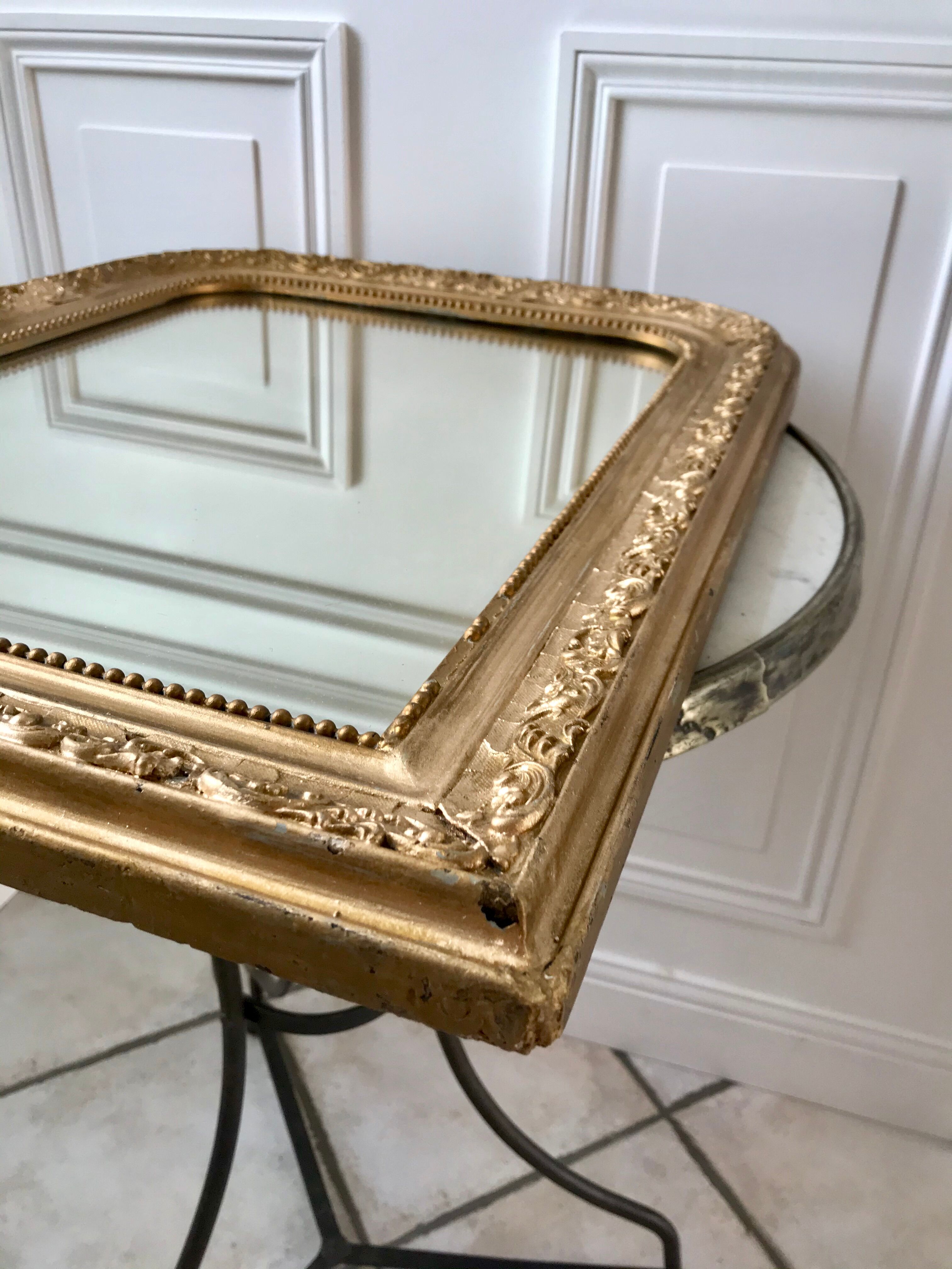 Wooden mirror and gilded stucco early twentieth century
