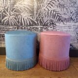 A pair of vintage velvet poufs.