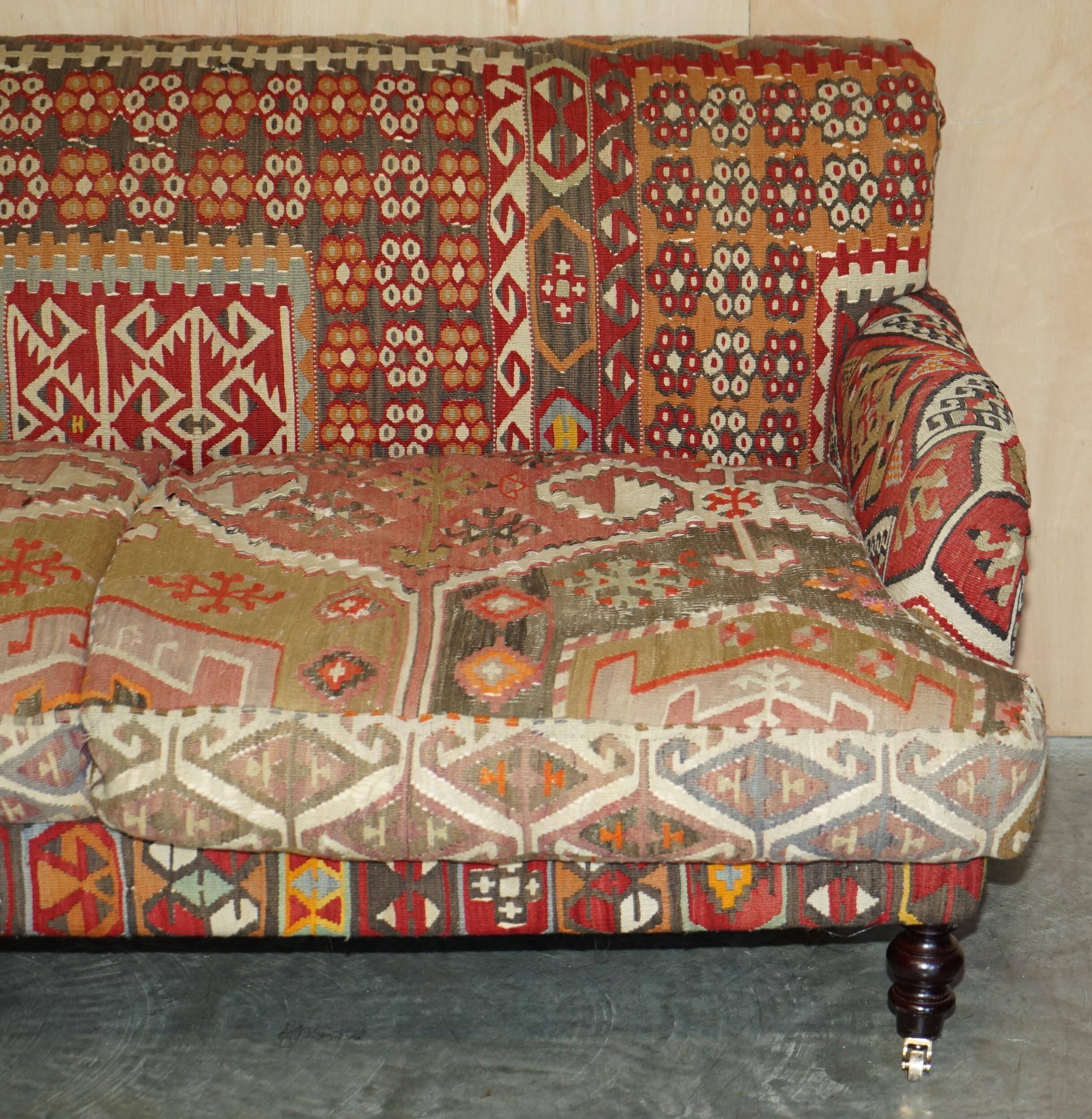 Vintage three-seater canapé by George Smith upholstered in Kilim with feather cushions.