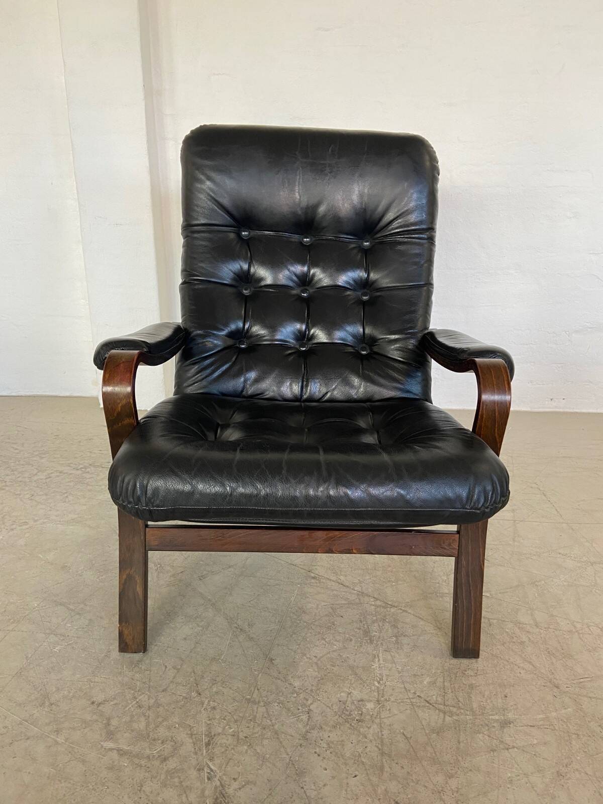 Vintage mid-century Scandinavian black leather lounge chair 1970s