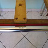 Table in red formica, 4 roc chairs, 2 extension cords, 2 drawers 60