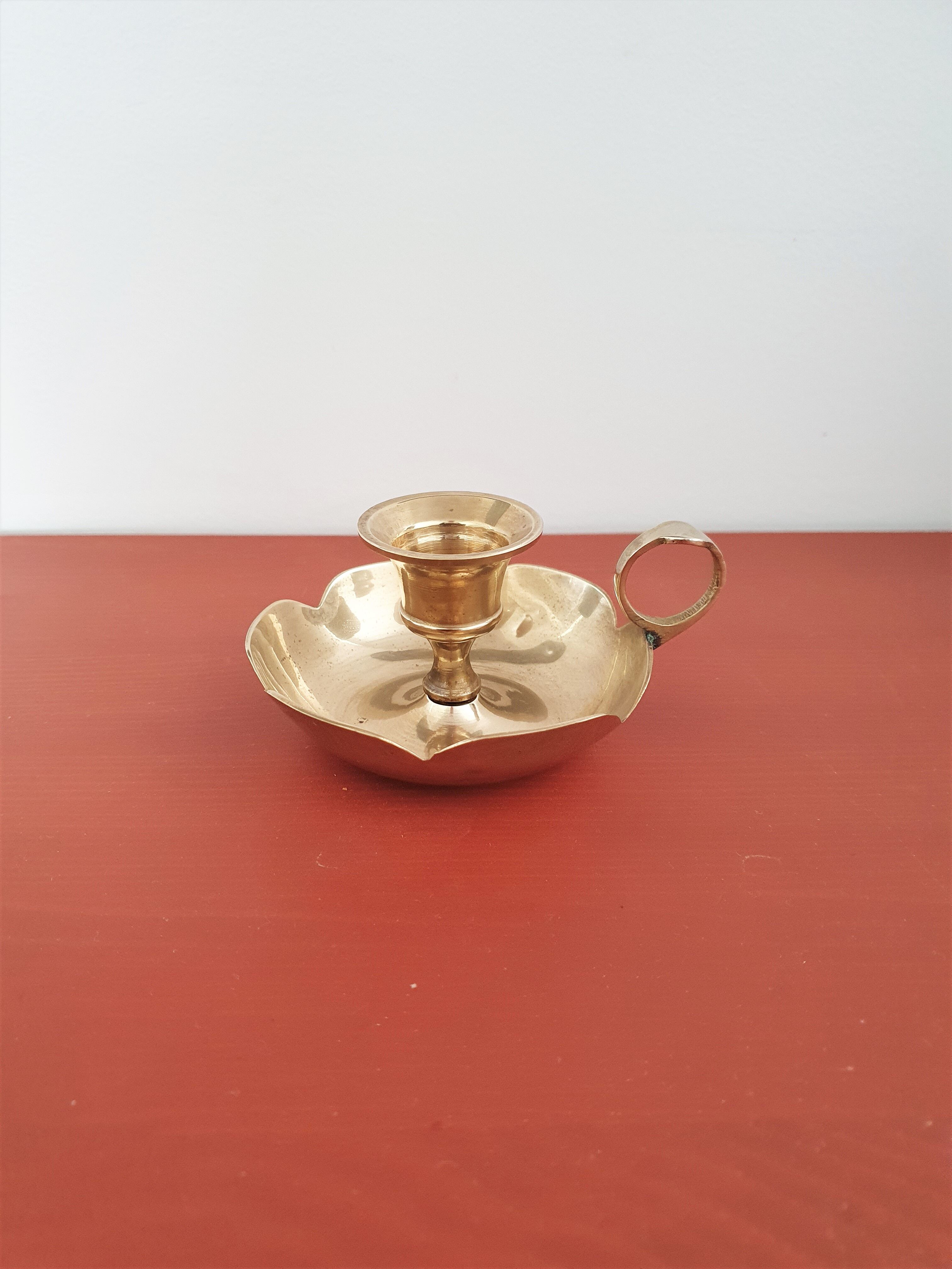 Golden brass candle holder