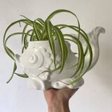 Zoomorphic fish pot cover in slip