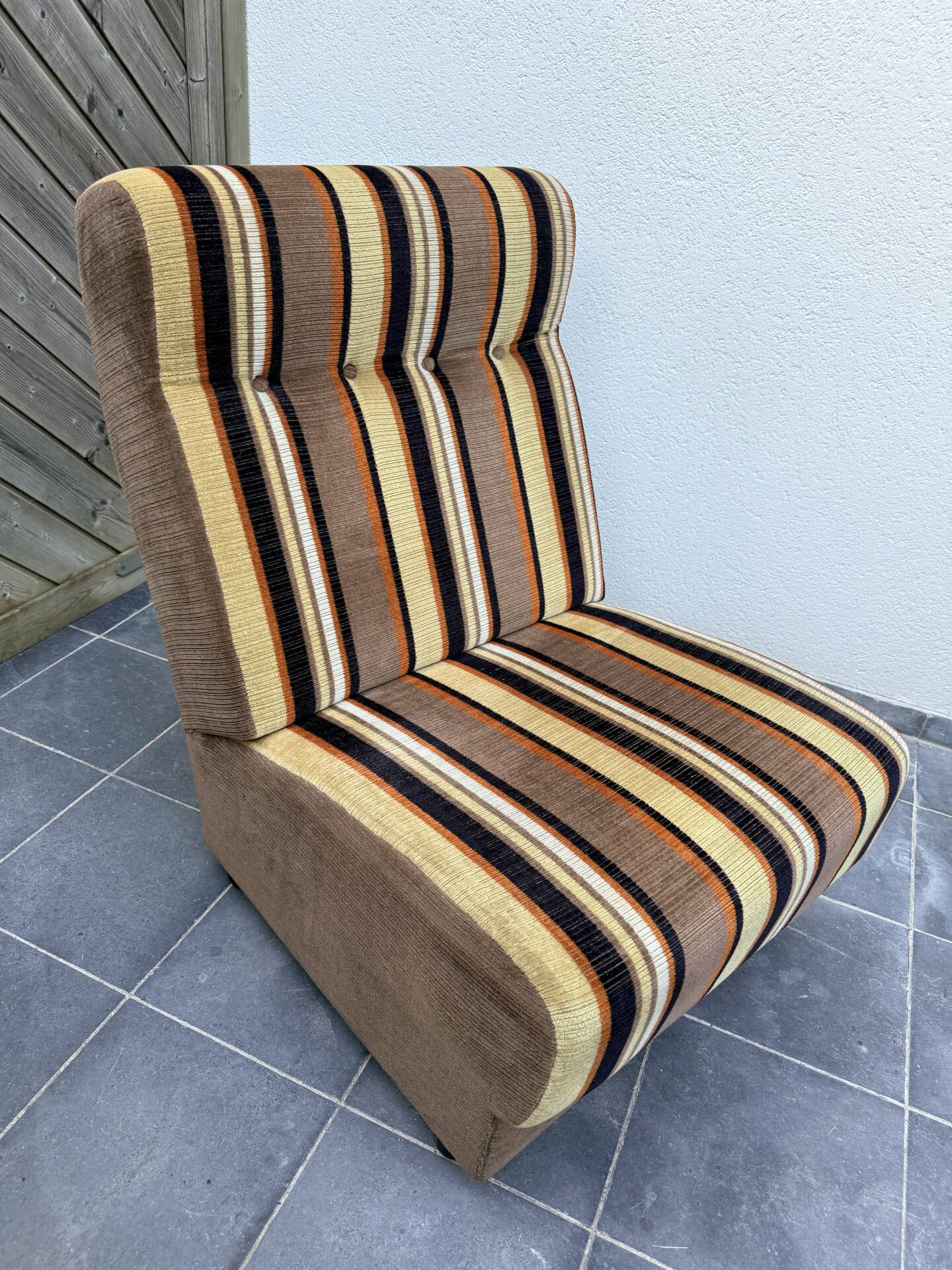 Vintage 1970s lounge chair – striped orange, brown, and cream velvet
