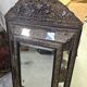 Antique mirror in repoussé and patinated copper from the Napoléon III era.