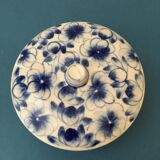 Porcelain candy dish. Blue flower patterns on white background