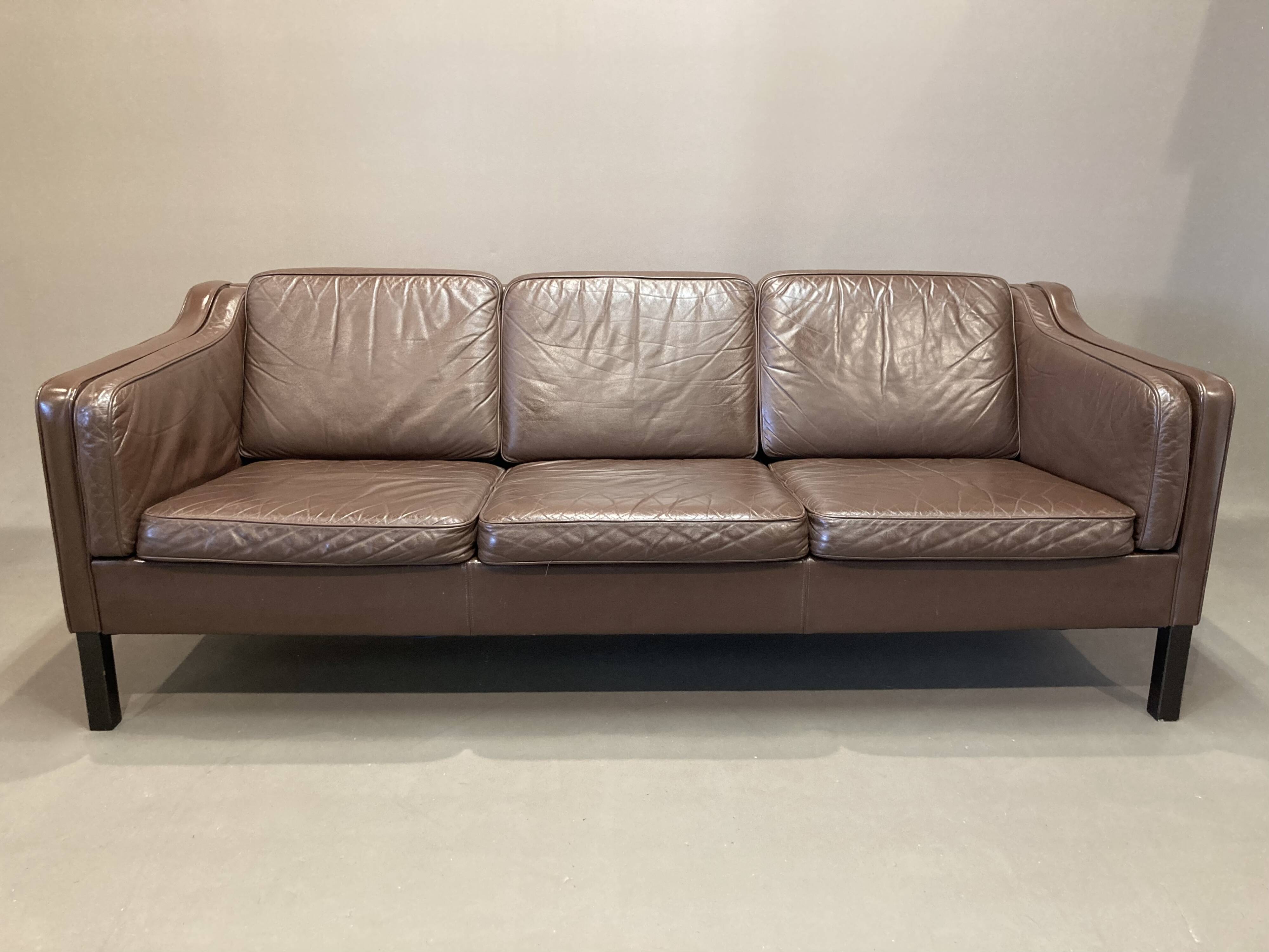 Scandinavian design 3-seater leather sofa.