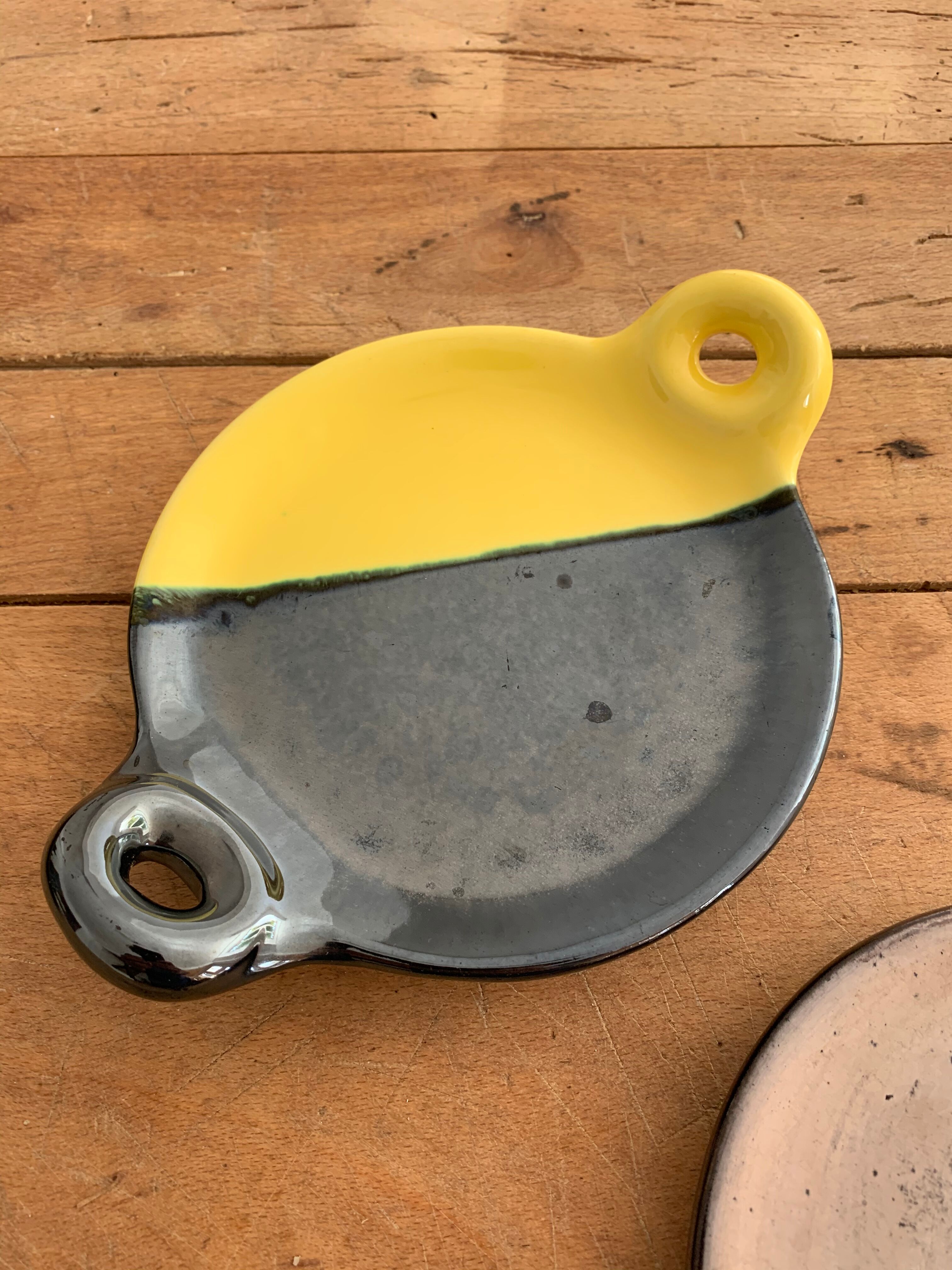 Duo of vintage earthenware cups