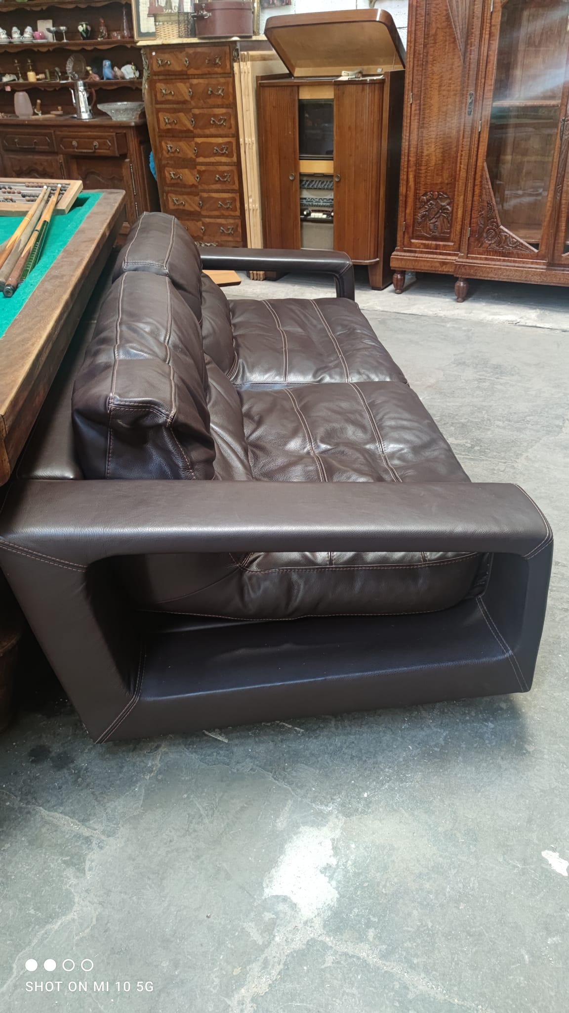 Four-seater sofa in dark brown leather from Steiner by designer Pascal Daveluy, model