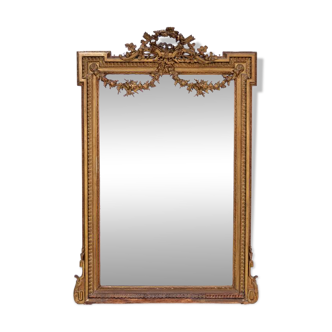 Large mirror in a gold frame, France.