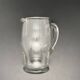 Glass jug with chiseled pattern