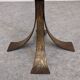 Brutalist floor candle holder in hammered gold steel, Belgium circa 1960.