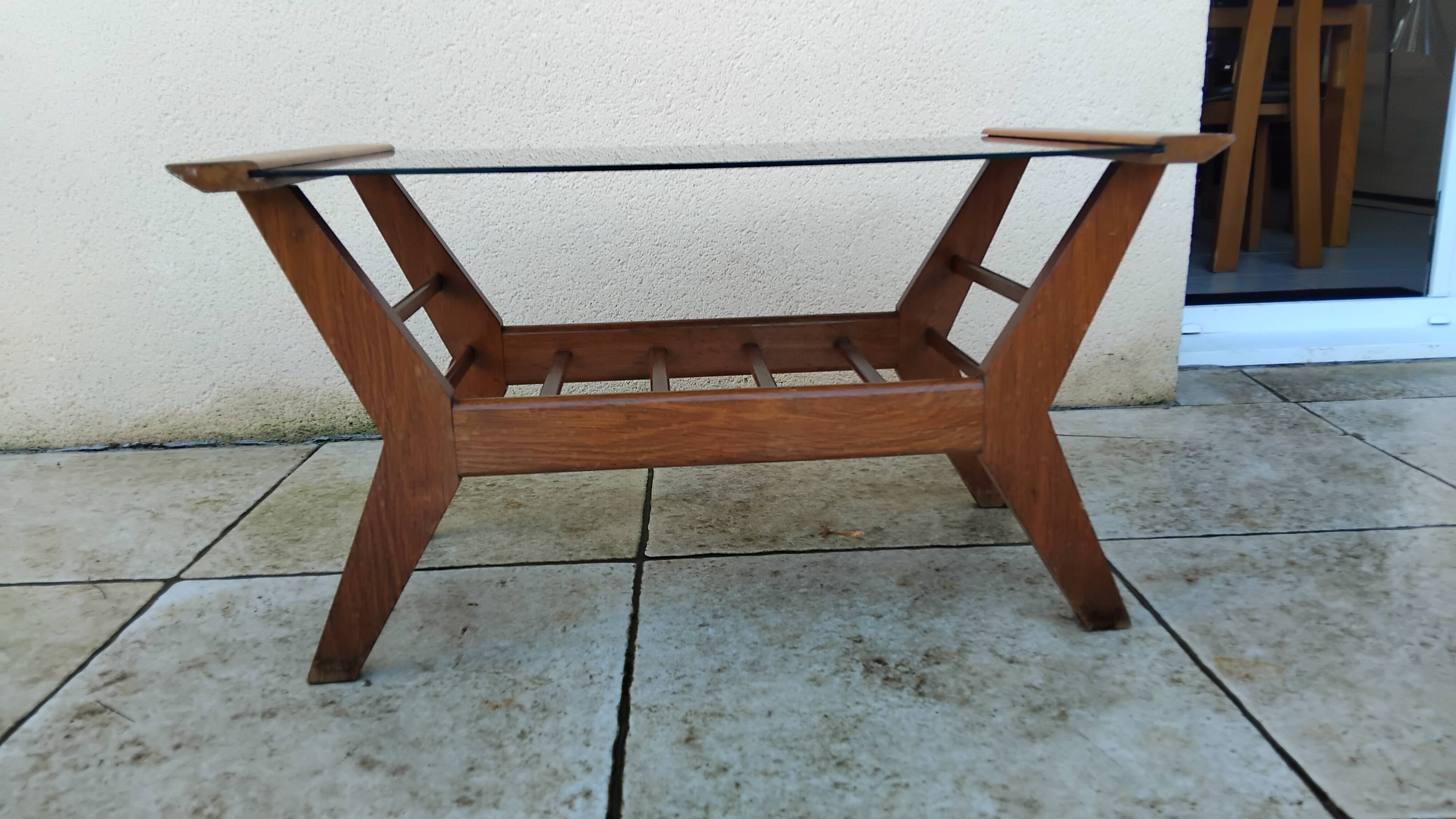 Vintage coffee table from the 1950s reconstruction, wood and glass.