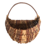 Old grape picker's basket wicker woven vines vintage wine