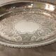 Oval plate in silver metal