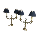 Pair of Louis XVI style double lamps in gilded bronze