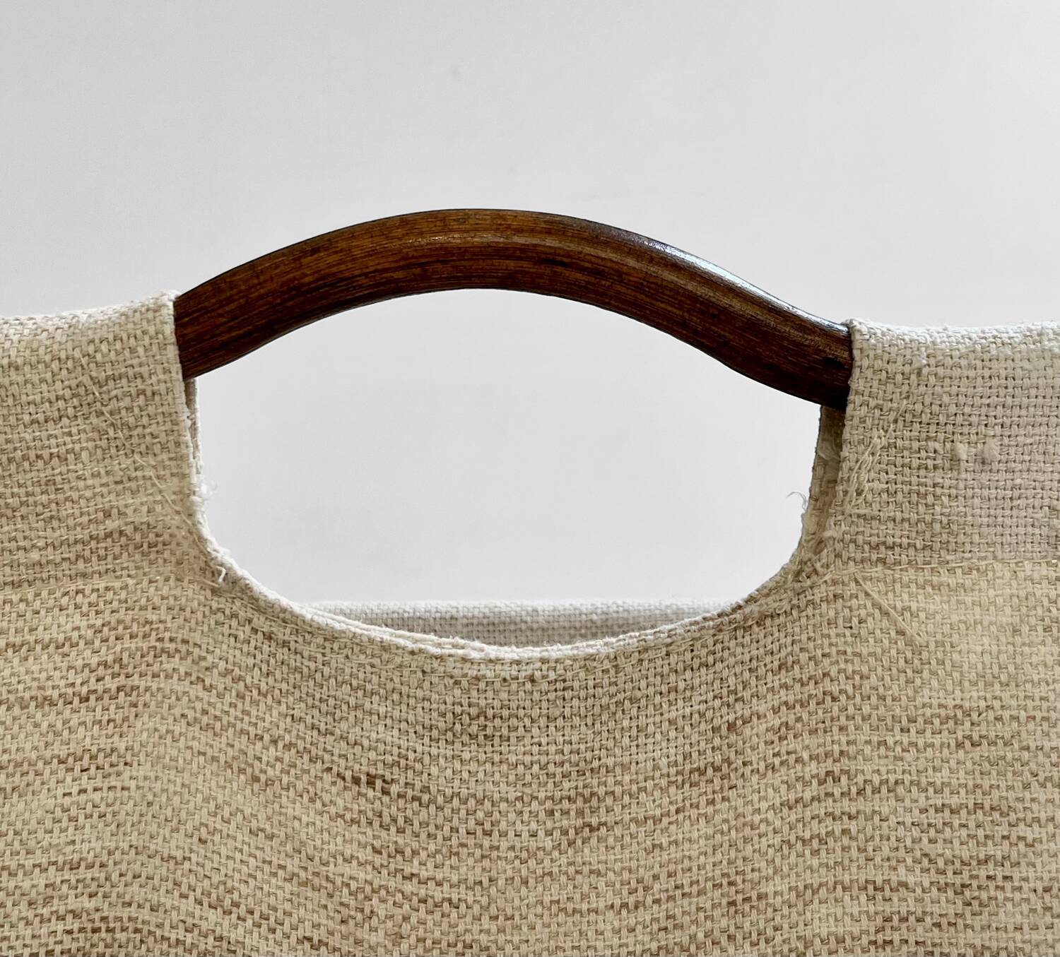 Vintage curved rattan magazine rack – 1960s