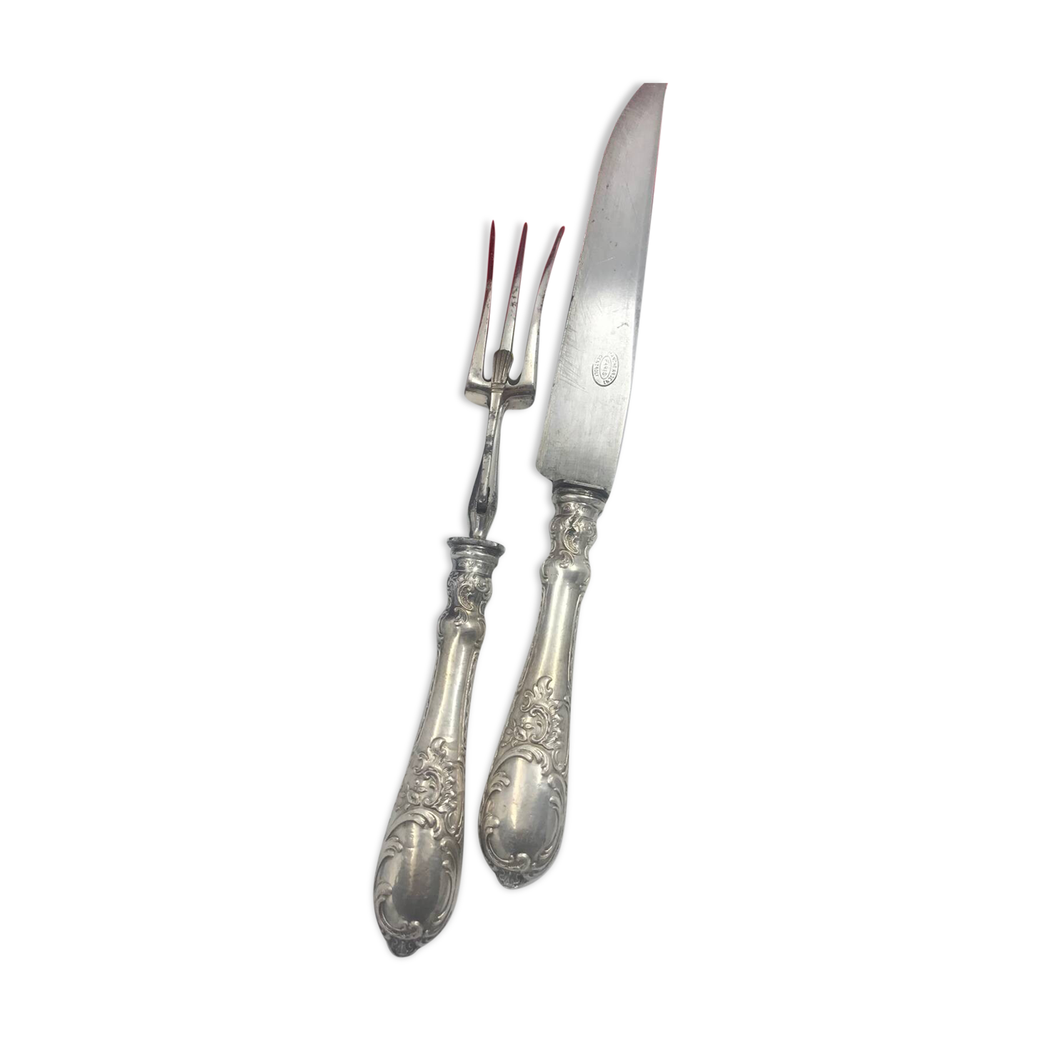 Antique silver-plated metal serving cutlery.